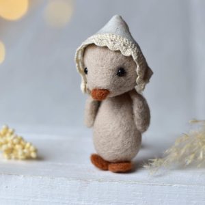 Felted duckling in cold beige | Felted photo props